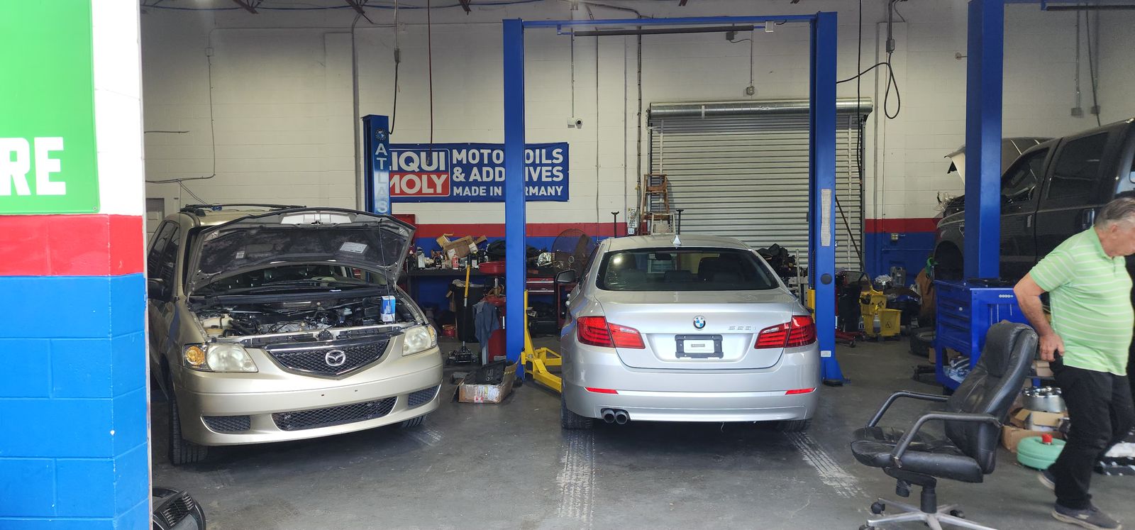 Vehicles being diagnosed inside the shop
